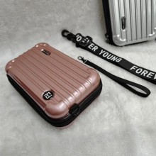 Bandolero,cartera,maleta rígida.